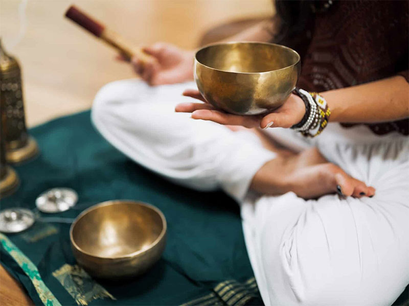 outdoor yoga with sound bowls