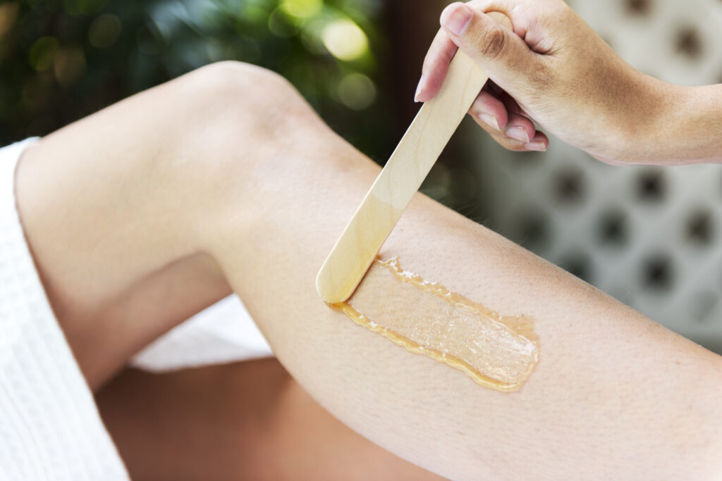 woman getting legs waxed at a spa 2021 09 02 21 41 01 utc 1024x683