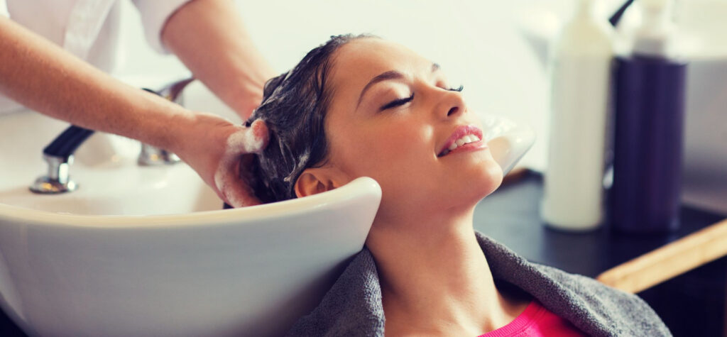 happy young woman at hair salon 2021 08 26 22 50 45 utc 1 1024x475