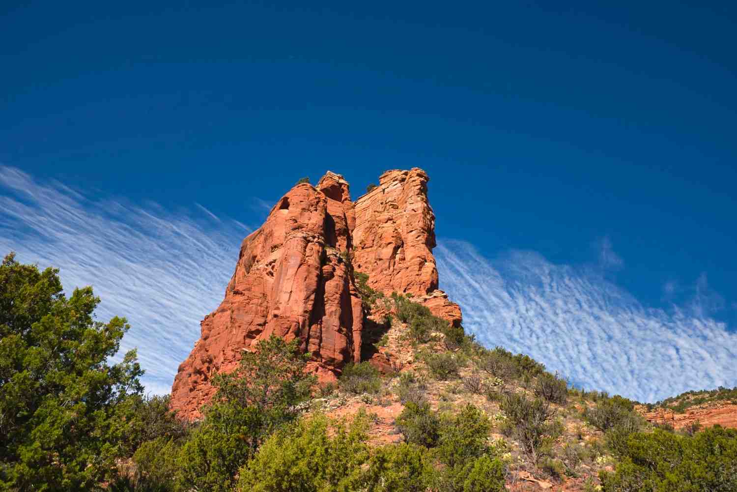 Red rock formation with dramatic sandstone spires